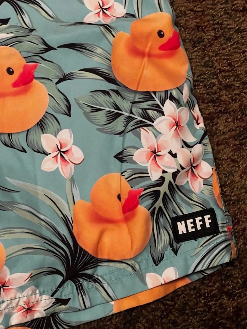 Neff Men’s Light Blue Swim Trunks with Orange Rubber Duck Print